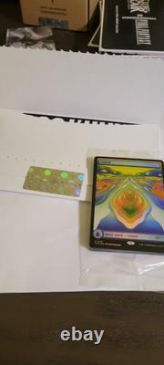 Secret Lair X Strange Sands Rainbow Foil Island (Sacred Veginee Land). Sealed